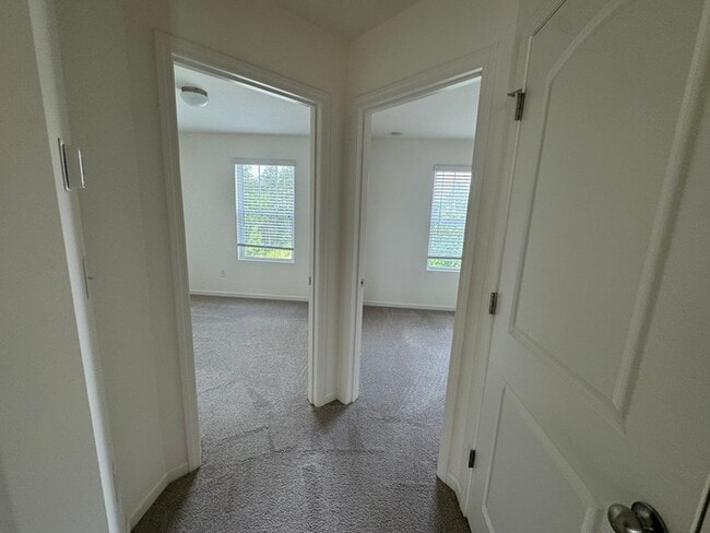 Building Photo - Corner townhome with three bedrooms 2 1/2 ...