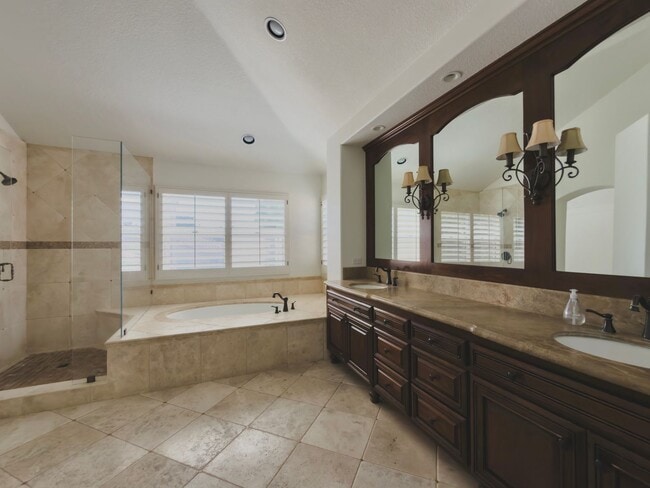 Building Photo - Elegant Mediterranean Living with Private Pergola Garden & Resort Amenities