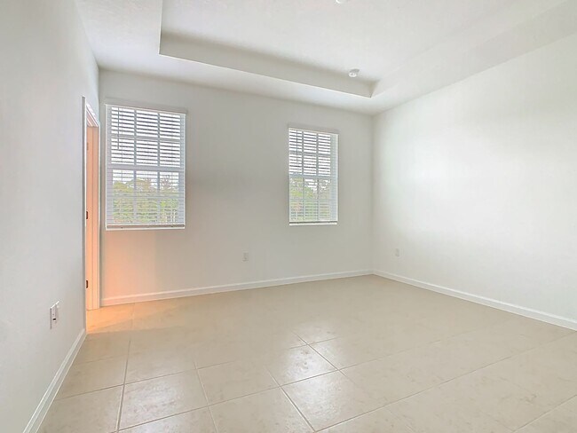 Building Photo - New Luxury Townhome in Celebration, FL Corner unit.  All porcelain tiled floors.  Aleutian model ...