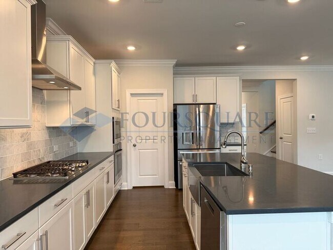 Building Photo - Spacious Corner-Lot Home with Guest Suite, Screened Porch & Detached 2-Car Garage – Resort-Style ...