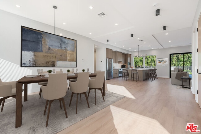 Building Photo - 8670 Encino Ave