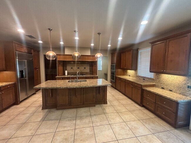 Building Photo - Short Term Lease - Grand 4-Bedroom Home with Entertainer's Yard in Gated River Village!