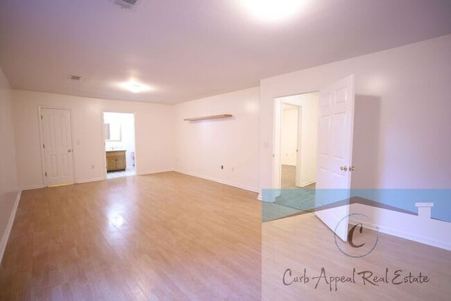 Building Photo - First month move in special $900!! Beautiful 3-bed, 2 bath condo with fireplace, 2-car garage - i...