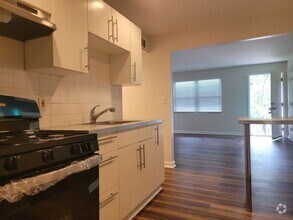 Building Photo - Fully Renovated East Point Gem – Minutes f...