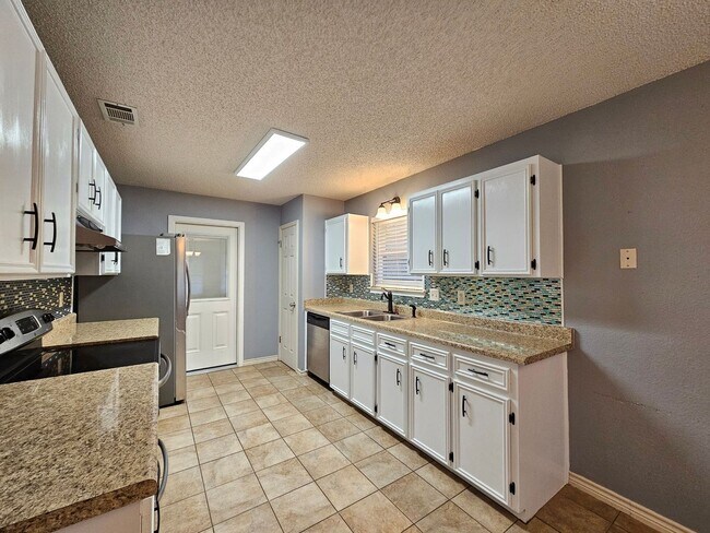 Building Photo - NEW IN MANAGEMENT - AVAILABLE NOW!