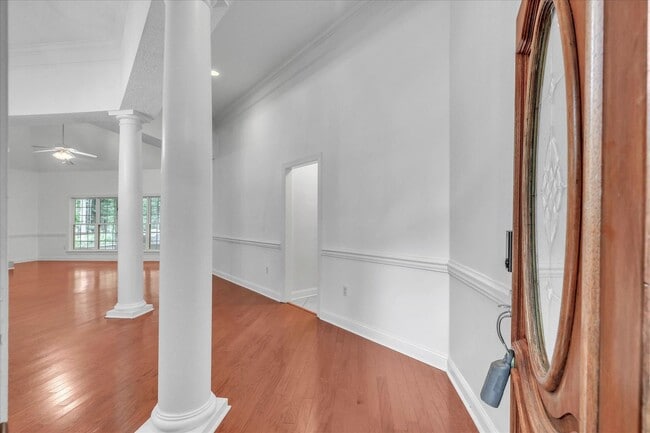 Building Photo - Stunning all-brick home on a large wooded lot