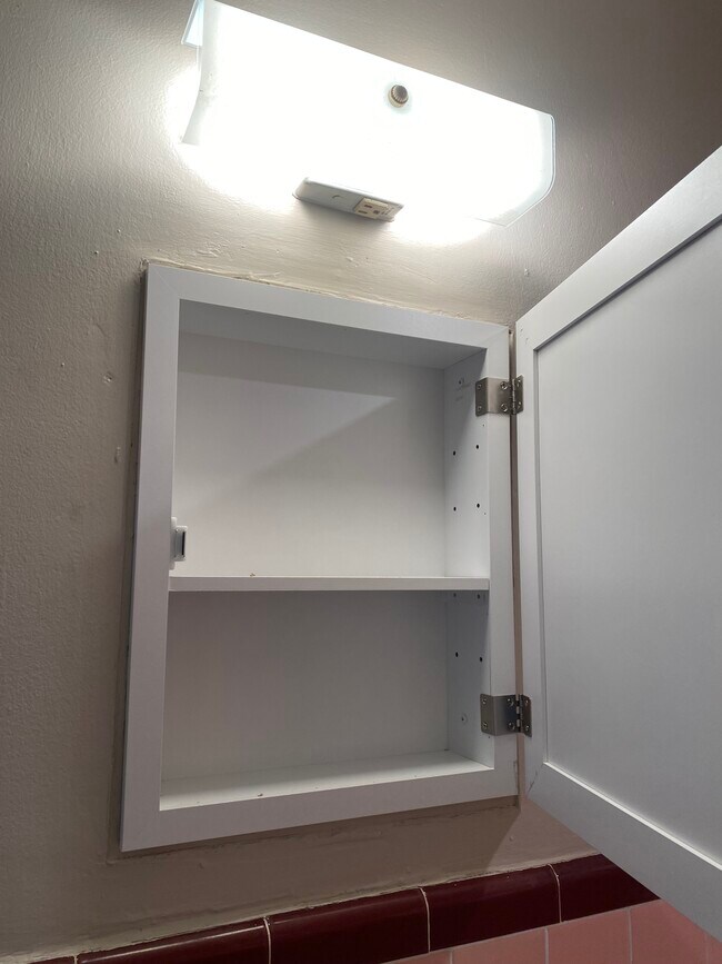 Medicine cabinet. - 114 E Main St