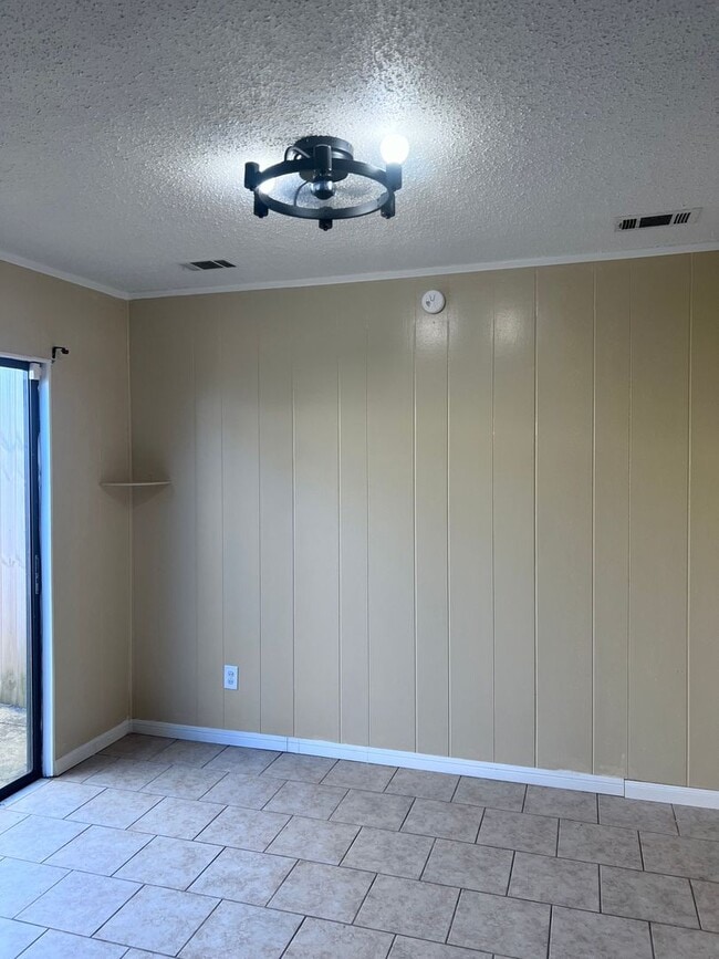 Building Photo - Introducing a 2-bedroom, 1.5-bathroom condo that offers the perfect blend of comfort and convenie...