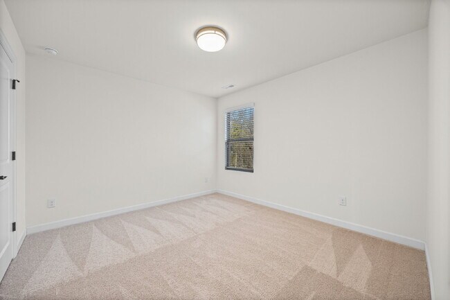 Building Photo - Classic finishes paired with an open, versatile layout!