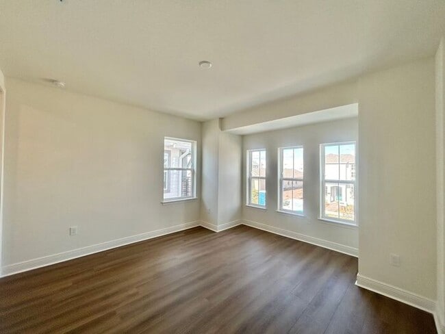 Building Photo - Gorgeous 4/3 Residence with a Private Back Lanai and a 3 Car Garage in the Delightful Laureate Pa...