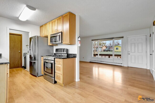 Building Photo - Cozy Abbott Loop Single Family Home w/ Garage & Fenced in Yard