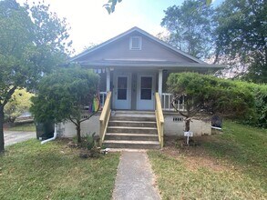 Building Photo - Big kitchen. Fenced yard. Walltown location. Under $1,300.