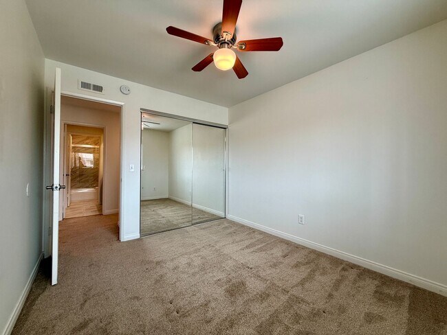 Building Photo - Spacious 4 Bedroom House with Large Fenced Yard! Landscaping Included! Two Car Garage!