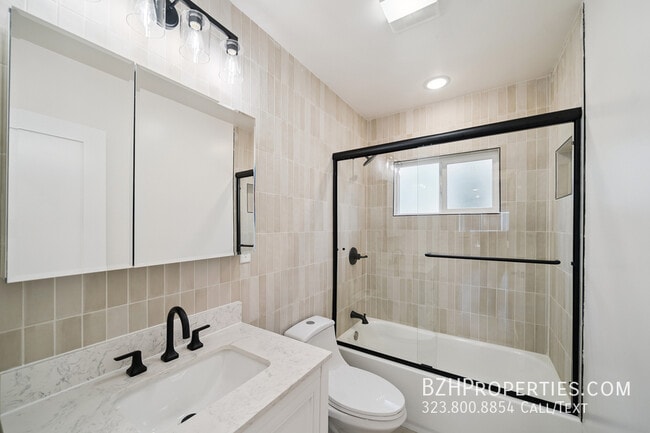 Building Photo - 7209 Willoughby Ave