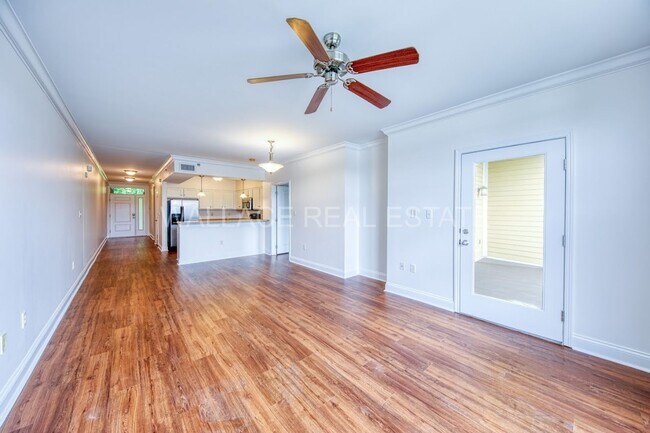 Building Photo - 3 BEDROOM CONDO IN RIVER TOWNE - A GATED LAKEFRONT COMMUNITY!!