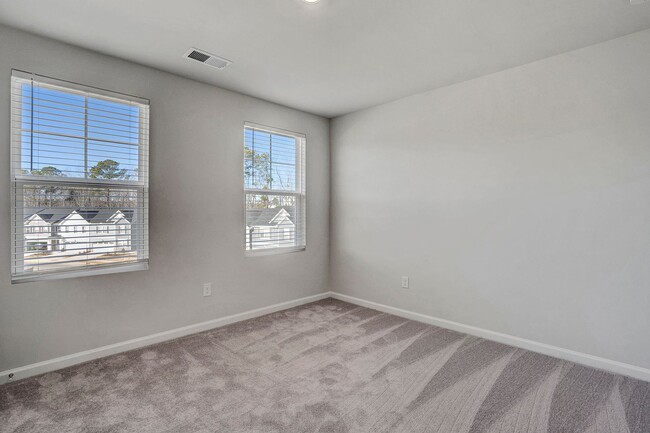 Building Photo - BRAND NEW TOWNHOME Available now, Depot 49...