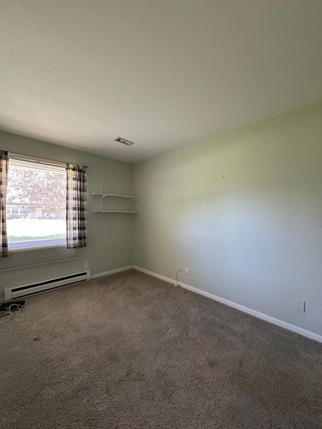 Building Photo - Not Your Typical Rental — Warm, Welcoming 3BR Brick Ranch in a Prime Neighborhood