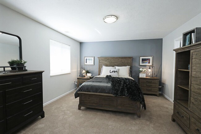 Spacious Primary Bedroom - Compass Pointe Apartments