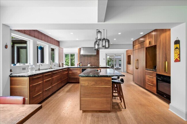 Building Photo - Stunning Updated Home with Private Pond Views in Chappaqua