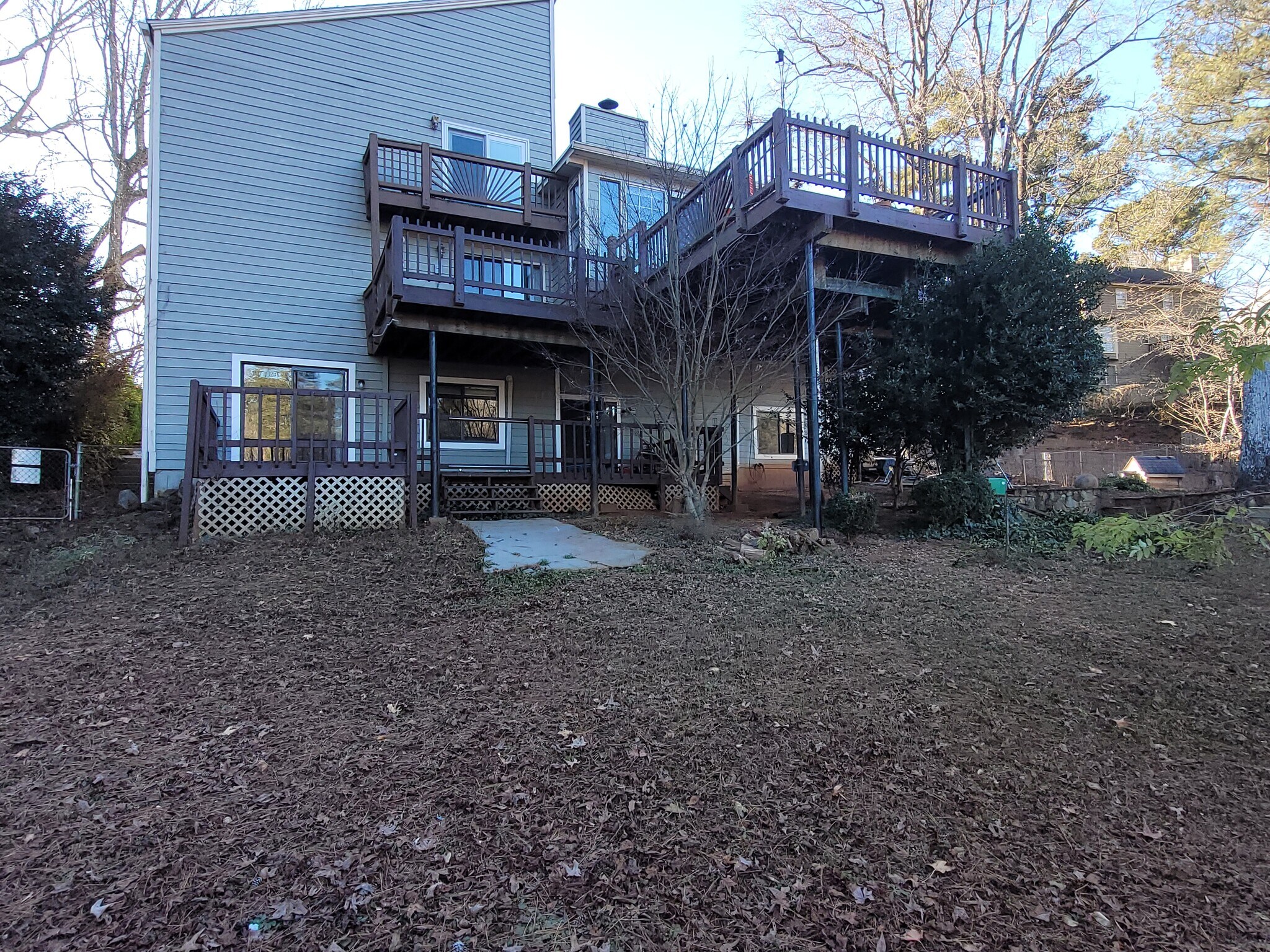 Back of house: bottom deck belongs to apt. - 967 Smoketree Dr