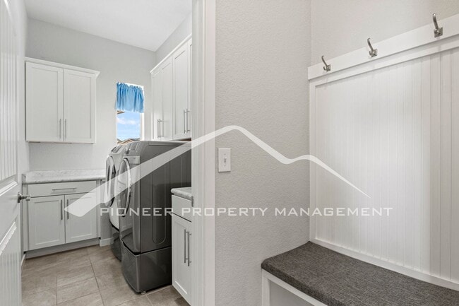 Building Photo - Elegant Ranch-Style Home with Main Floor Primary Bedroom with 3-Car Garage and Finished Basement ...