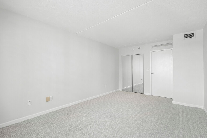 Convenient closet with mirror doors. - 4 Martine Ave