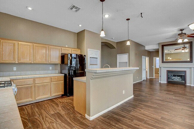 Building Photo - Gorgeous NW Single Story! 3 Car Garage! Serene Backyard.