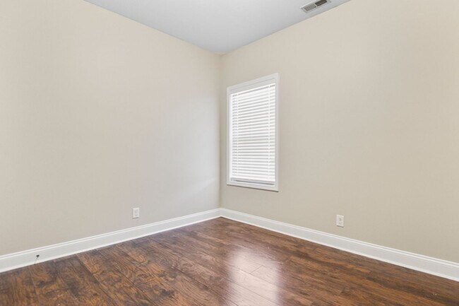 Building Photo - Pet Friendly Three Bedroom with Bonus!