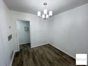 Building Photo - REMODELED TOP FLOOR 2BR/1BA IN SMALL AND Q...