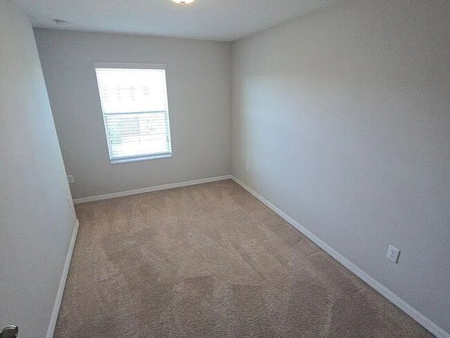 Building Photo - Spacious Townhome with Pond Views | 3BR + Loft + Screened Patio