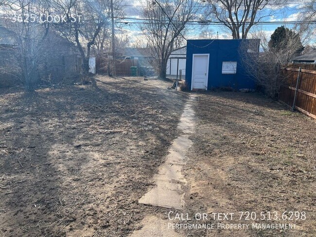 Building Photo - Charming Tiny Blue House Available for Imm...