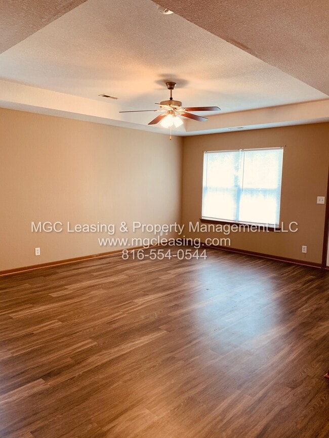 Building Photo - Charming Brick Ranch Duplex in the Heart of Lone Jack - Ready Now