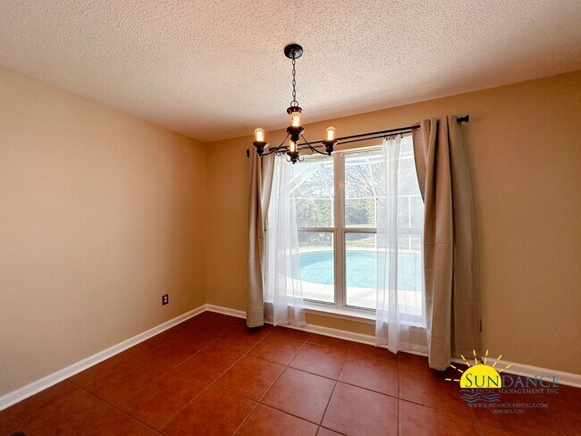 Building Photo - Lakefront home with Enclosed pool centered between Eglin and Hurlburt