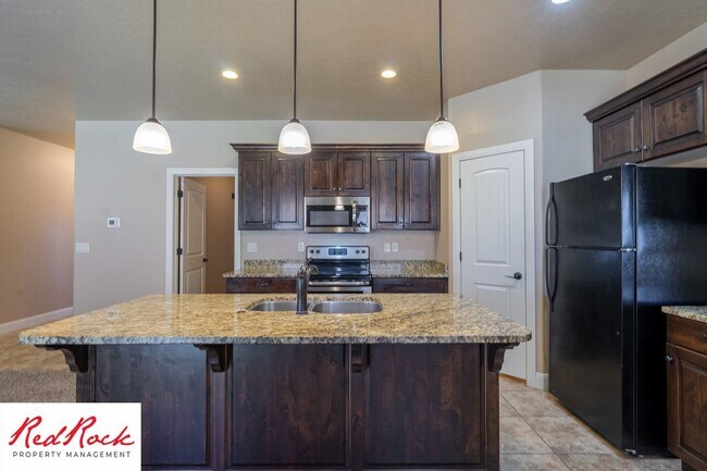 Building Photo - Dog Friendly, Pleasant 4 Bedroom, 2.5 Bathroom Townhome