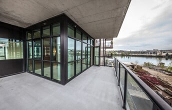 Building Photo - Spacious Luxury Riverfront Condo Near NW 23rd! Parking, Storage, Most Utilities Included!