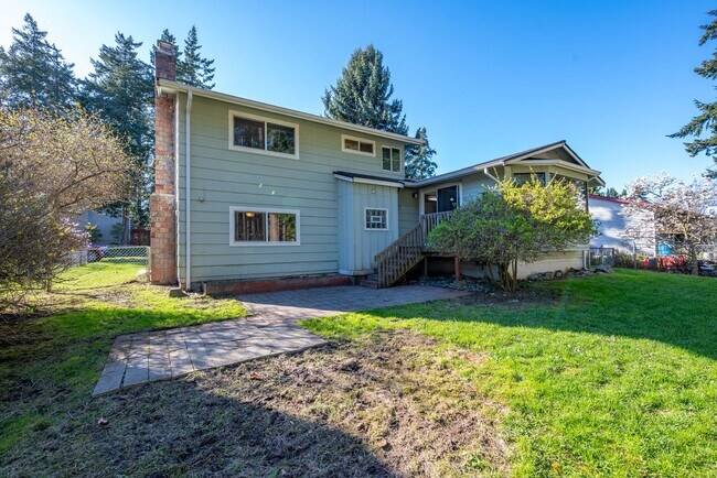Building Photo - Spacious 4-Bedroom Home with Fireplace, Fenced Yard, and 2-Car Garage
