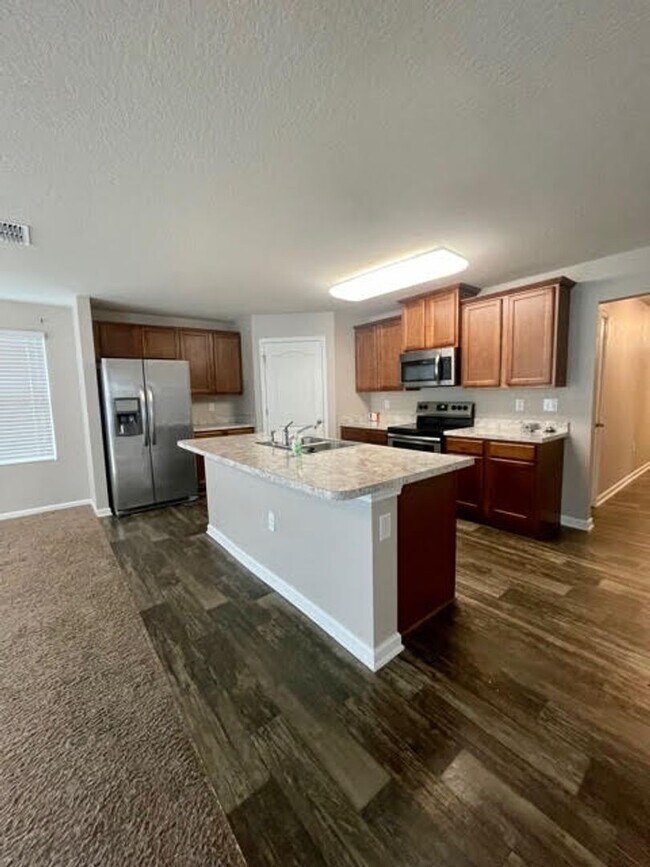 Building Photo - Practically New Home