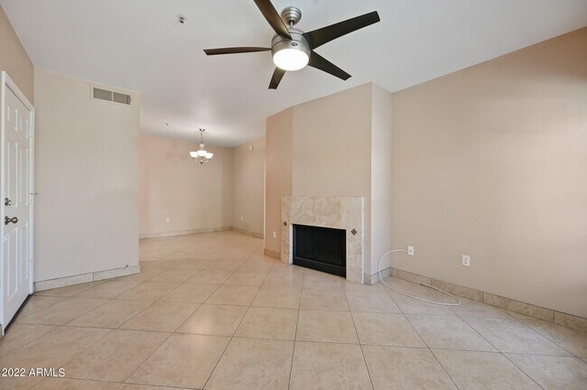 Building Photo - 9451 E Becker Ln