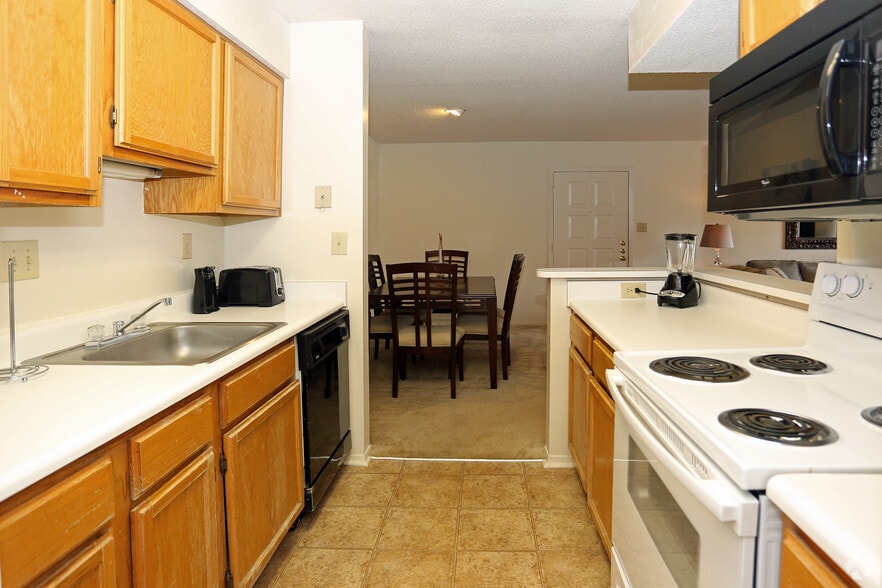 1BR 1BA Kitchen - Pass Pointe Apartments
