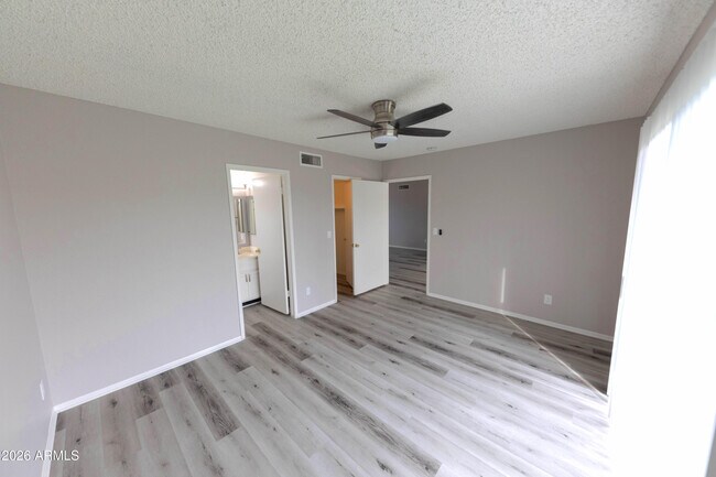 Building Photo - 10713 West Campbell Ave
