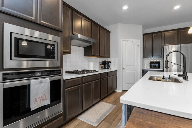 Building Photo - ASK ABOUT FREE APPLICATIONS THROUGH AUGUST!  "Spacious 6-Bedroom Retreat with 3.5 Baths and Over ...