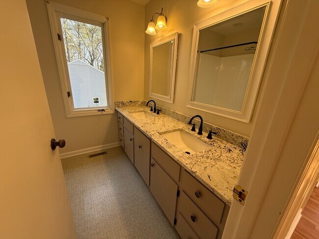 Building Photo - Spacious ranch, fenced yard, 2 car garage, large basement, near Wake Tech