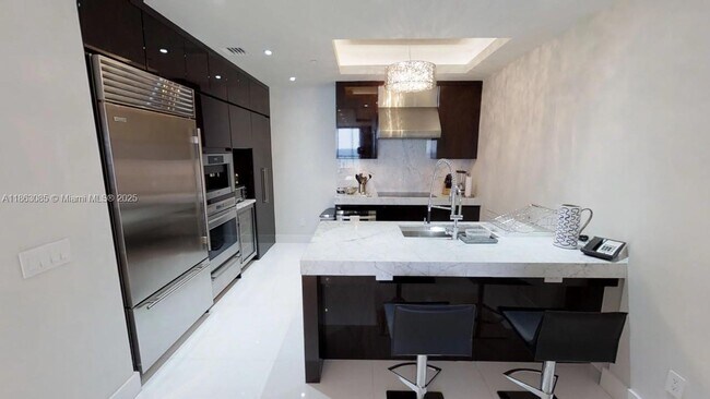 Building Photo - 9701 Collins Ave
