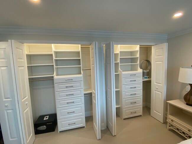 2 of the 3 closets in primary bedroom - 1620 S Ocean Blvd
