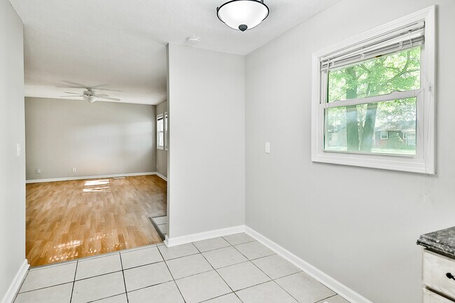 dining opening to living room - 7811 Randy Rd