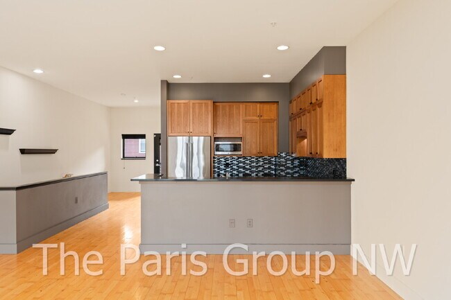 Building Photo - Exceptional 2 Story CapHill Condo * 2 Pkg Spaces, EV Charger & Rooftop Views