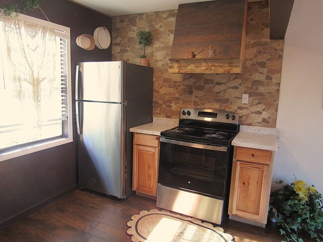 Building Photo - Fully Furnished Humble Duplex on the Water