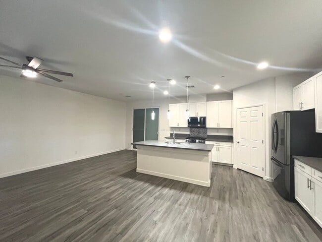 Building Photo - Single-story 1326 sq ft, townhome built in 2019 w/3 bed, 2 bath & spacious attached 2-car garage ...