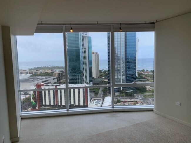 Building Photo - Moana Pacific - 2 bedroom plus den, 2 bath Condo with 2 parking - avail now!
