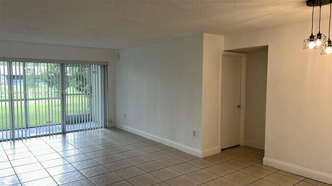 Building Photo - 4215 N University Dr